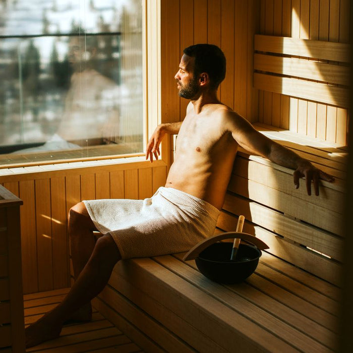 Relaxing in a sauna after a stressful day at work